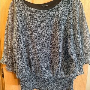 Elegant Black and White Patterned Blouse